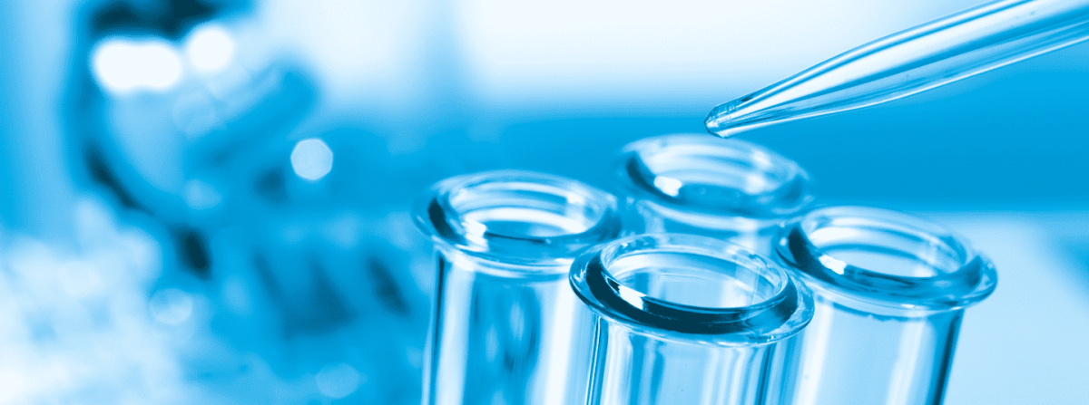blue vials of liquid in a lab